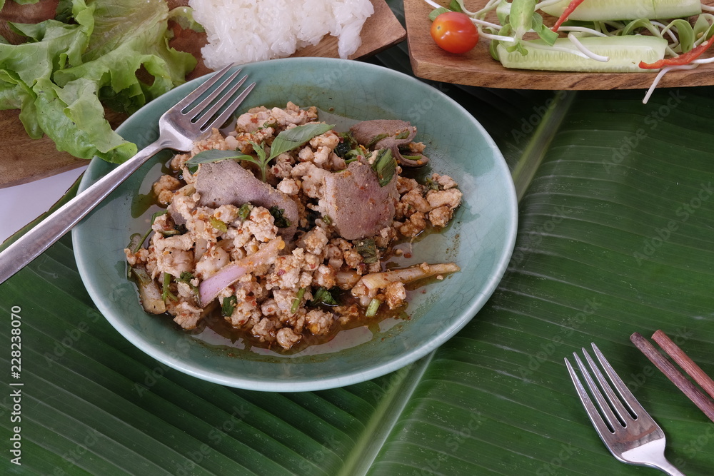 Traditional Thai food spicy minced pork salad, minced pork mash with spicy.