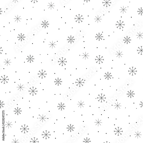 Hand drawn winter seamless patterns with snowflakes