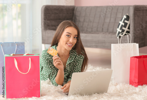 Young woman shopping online...