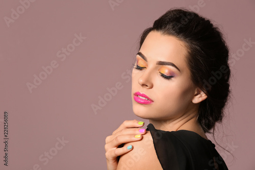 Beautiful young woman with ...