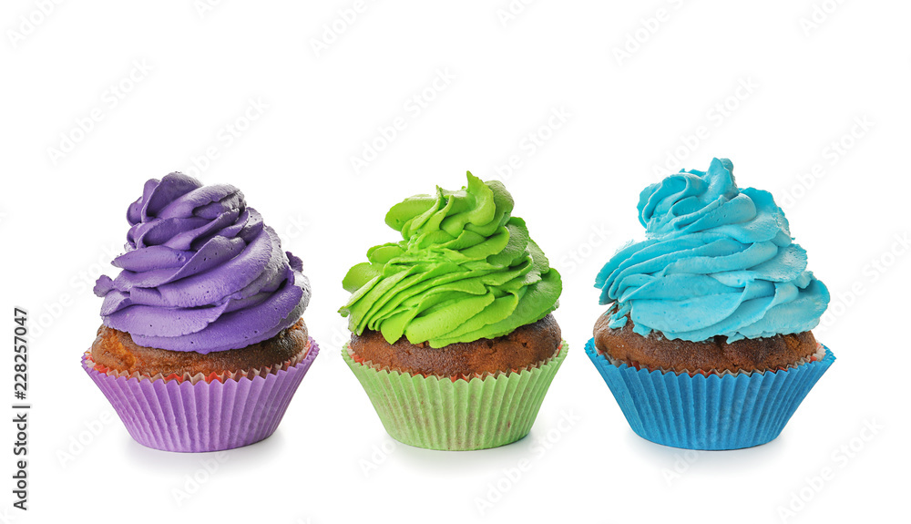 Delicious colorful cupcakes on white background Delicious colorful cupcakes on white background