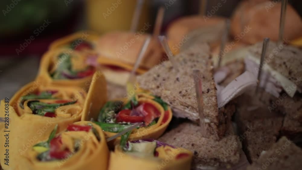 Close up of wraps and sandwiches on tray.mov Close up of wraps and sandwiches on tray.mov