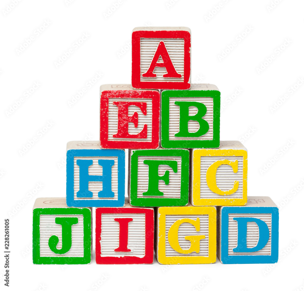 Wooden alphabet blocks isolated on white background Wooden alphabet blocks isolated on white background