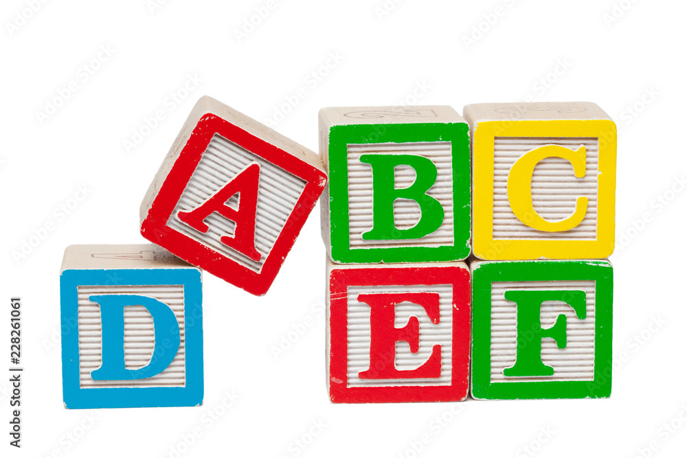 Wooden alphabet blocks isolated on white background Wooden alphabet blocks isolated on white background