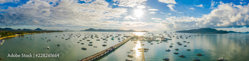 aerial view sunrise above Chalong gulf. Chalong marina is a center for intense boating activity..at Chalong pier is a large port in Phuket there have two bridges to transport and service for tourists