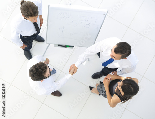view from the top. background image of handshake of business partners