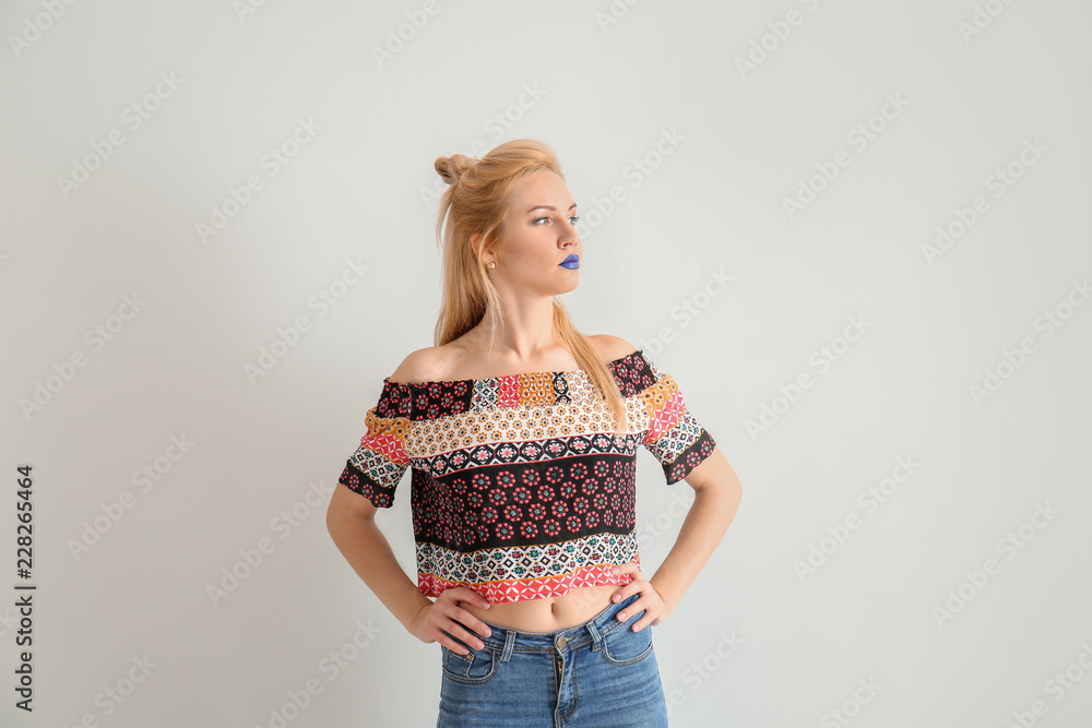 Portrait of beautiful woman with unusual lipstick on white background Portrait of beautiful woman with unusual lipstick on white background