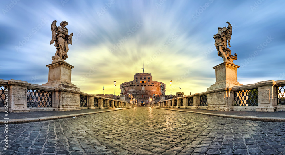 Panoramic low angle view of Sant'Angelo bridge and castle on sunrise in Rome, Italy (HDR image)