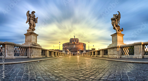Panoramic low angle view of Sant'Angelo bridge and castle on sunrise in Rome, Italy (HDR image)