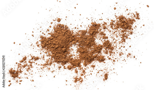 Pile cocoa powder isolated on white background. Top view