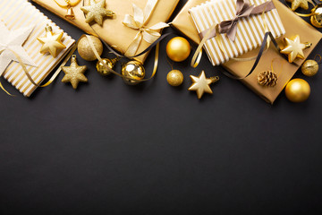 Golden silver christmas deco on black