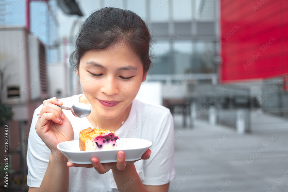 Young woman eating dessert Young woman eating dessert