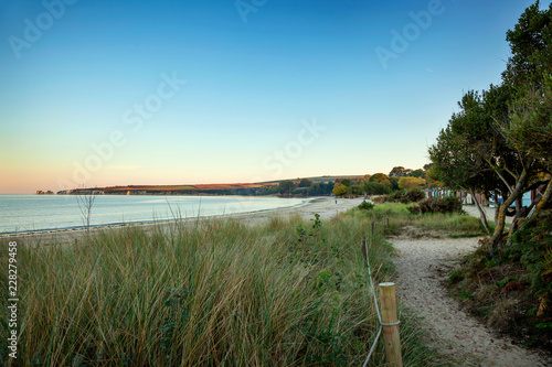 View over the beach and Old Harry Rocks at South beach, Studland, Dorset. Taken at dusk