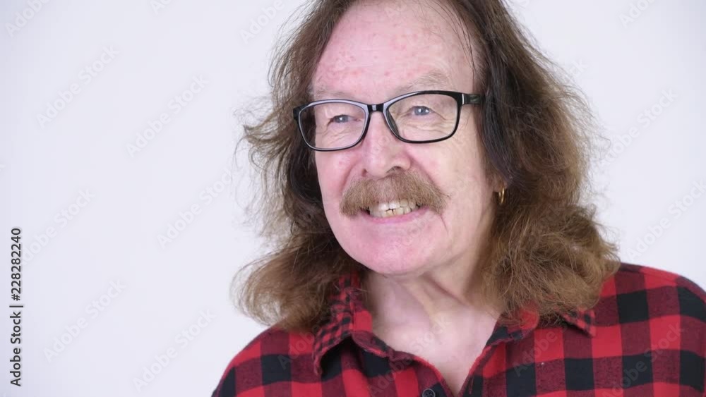 Happy senior hipster man with mustache wearing eyeglasses Happy senior hipster man with mustache wearing eyeglasses