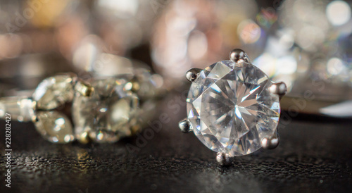 Jewelry diamond rings set on black background close up