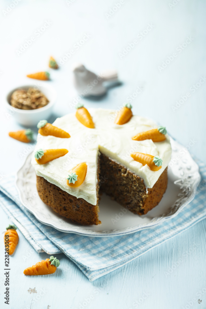 Homemade carrot cake with marzipan carrots