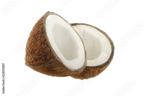 two halves of coconut isolated on white background