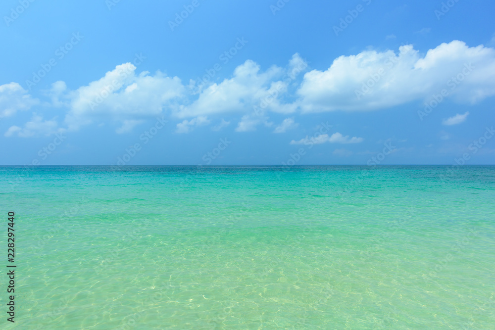 Tropical sea and wave against blue sky