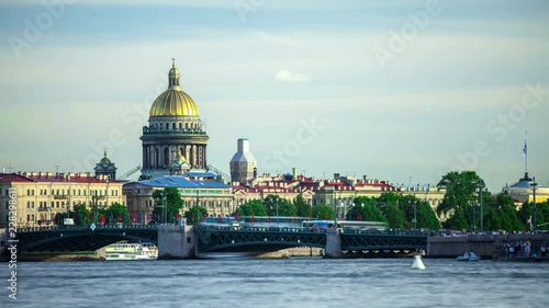 View on the Neva river and St Isaac's Cathedral. Shot in Saint-Petersburg. Timelapse. photo