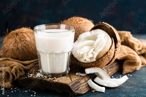 Fresh coconut milk in glass, vegan non dairy healthy drink