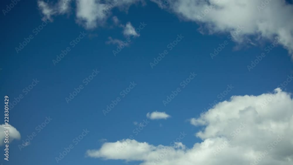 Clouds running across the blue sky. 4K timelapse. Clouds running across the blue sky. 4K timelapse.