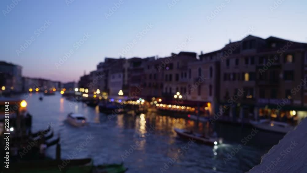 Panorama view from famous Rialto bridge of the Grand canal in evening Pretty city lights along the channel and old Venetian buildings 4k Panorama view from famous Rialto bridge of the Grand canal in evening Pretty city lights along the channel and old Venetian buildings 4k
