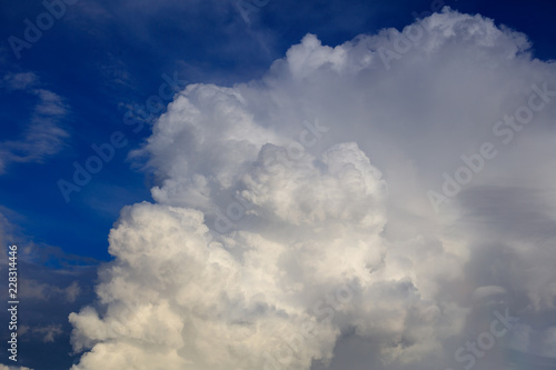 White creamy clouds in the sky as a background