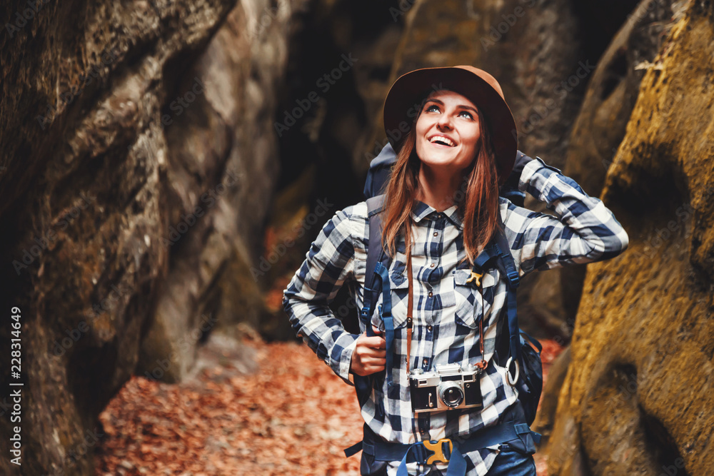 Travel young woman wearing brown hat 
