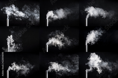 Canvas Print Smoke from a pipe on a black background