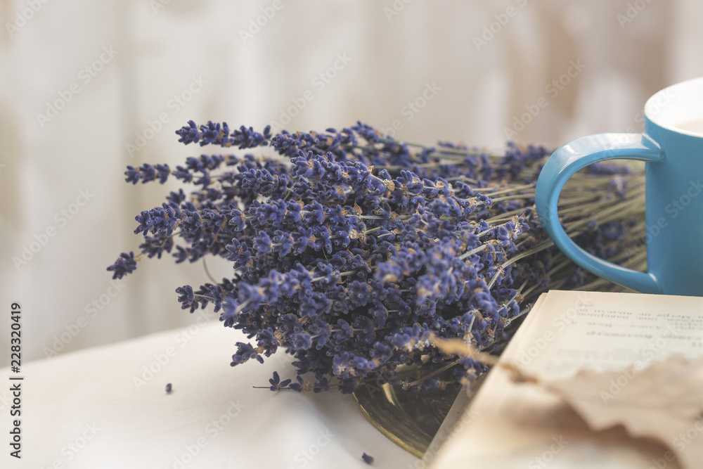 cozy autumn time spending reading l.bim book in bed ... the girl drinks her favorite coffee, next to her is lavender ... Provence style .. cozy autumn time spending reading l.bim book in bed ... the girl drinks her favorite coffee, next to her is lavender ... Provence style ..