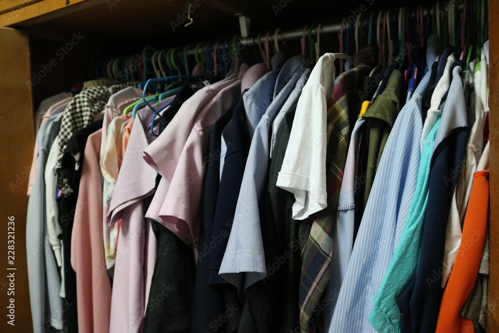 Clothes on a hanger in a closet Clothes on a hanger in a closet
