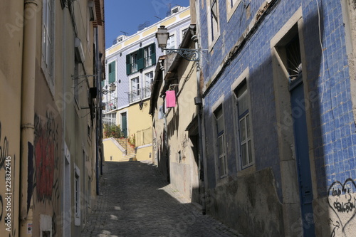 A narrow street in the old part of Lisbon, Portugal © Friemann