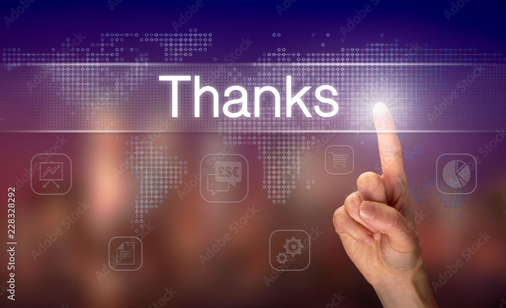 A hand selecting a Thanks business concept on a clear screen with a colorful blurred background. A hand selecting a Thanks business concept on a clear screen with a colorful blurred background.