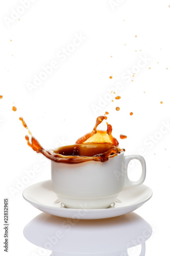 Black coffee in a white cup on a white background.