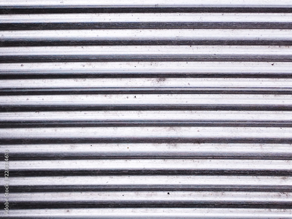 Corrugated stainless steel wall.