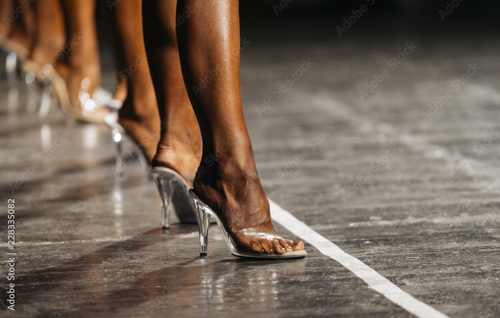 slender woman legs in high heels. women to compete in fitness bikini Stock  Photo | Adobe Stock