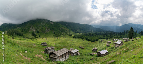 Gorgit highland with old houses and green valley in Blacksea region, Artvin, Turkey © CanYalicn