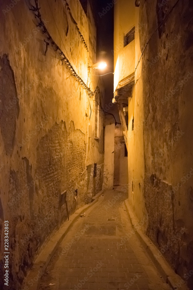 Night old narrow street of the largest medina in the worlds, Unesco, Fez, Morocco in Africa