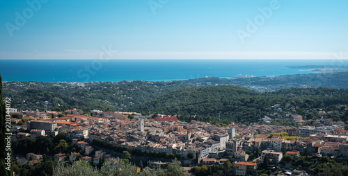 View of Vence  Provence from a mountain road above the town  mediterranean sea behind