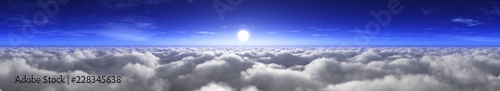 Over the clouds, a panorama of the sunset in the clouds 