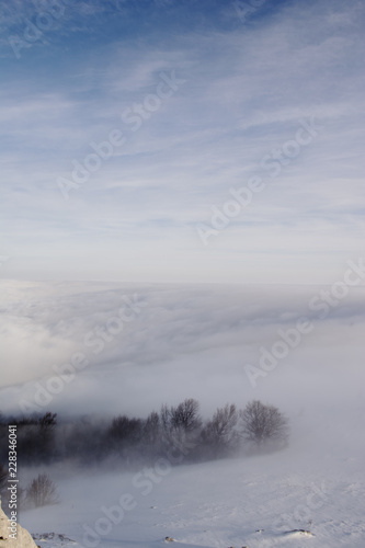 Winter peyhazh mountains in the fog