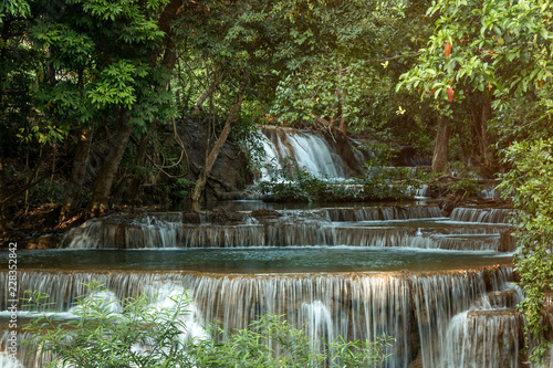 Fototapeta Naklejka Na Ścianę i Meble -  Huay Maekamin Waterfall Tier 4 (Chatkaew) in Kanchanaburi, Thailand; photo by long exposure with slow speed shutter