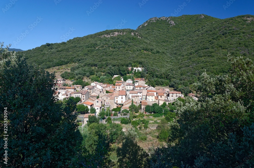 Mediterranean french village surrounded by green hills