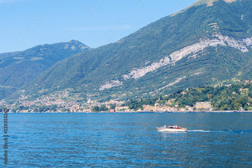 Yacht cruising on Lake Como Yacht cruising on Lake Como