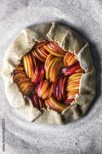 Overhead view of peach, apricot and nectarine galette photo