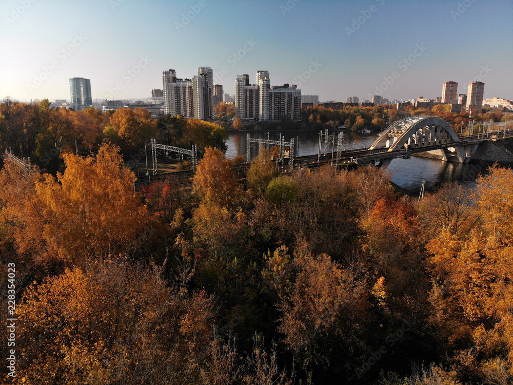 Obraz premium Top view of city of Khimki and railroad bridge in autumn, Russia