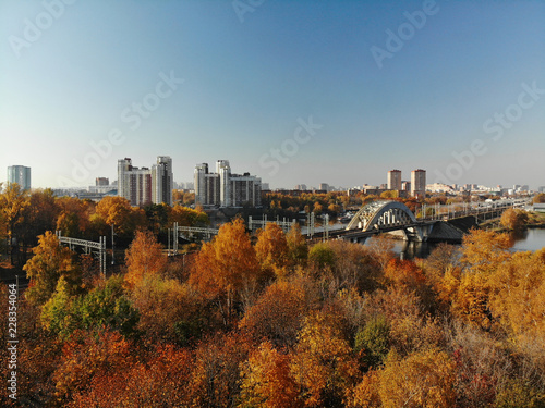Top view of city of Khimki and railroad bridge in autumn, Russia