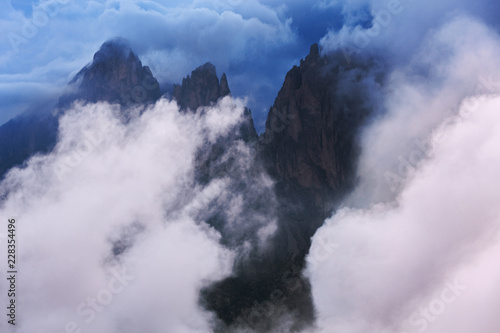 Clouds in front of mountains
