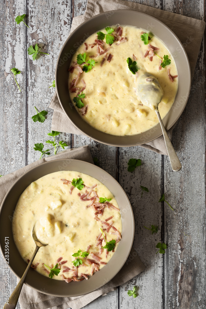 Two bowls of potato and leek soup. Two bowls of potato and leek soup.