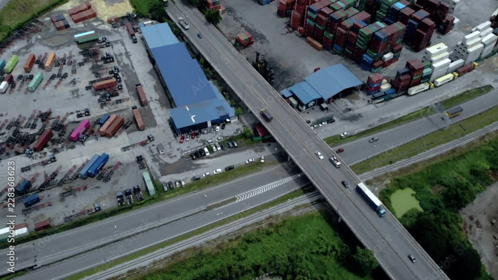 Shipping Container Traffic Drone shots of traffic and containers around the shipping port called ...